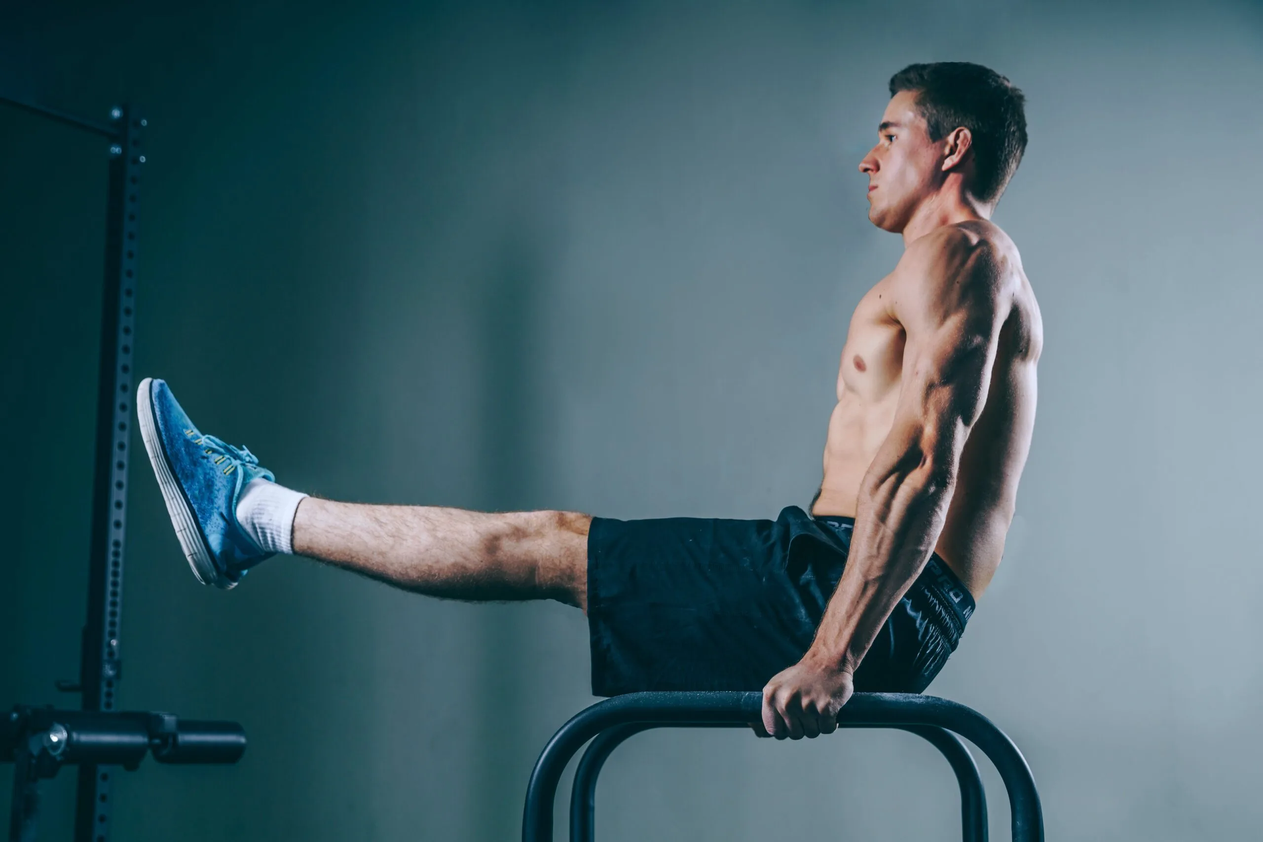 A man performing balance exercises to enhance stability and mobility, essential for longevity training.